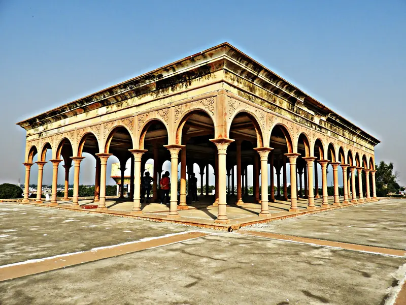 An arched stone pavilion on a terrace in Bharatpur
