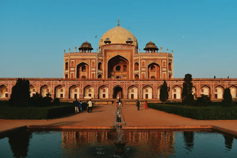 Humayun's Tomb in Delhi reflected in the garden fountain pool
